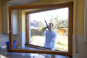 Washing Windows, 8 Easy Yard Care Tips to Help Sell Your Home